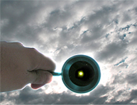 Blue RIng finding sun in clouds